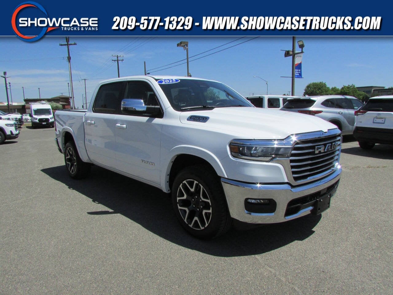2025 RAM 1500 Laramie in Bright White Clearcoat — front three-quarter view