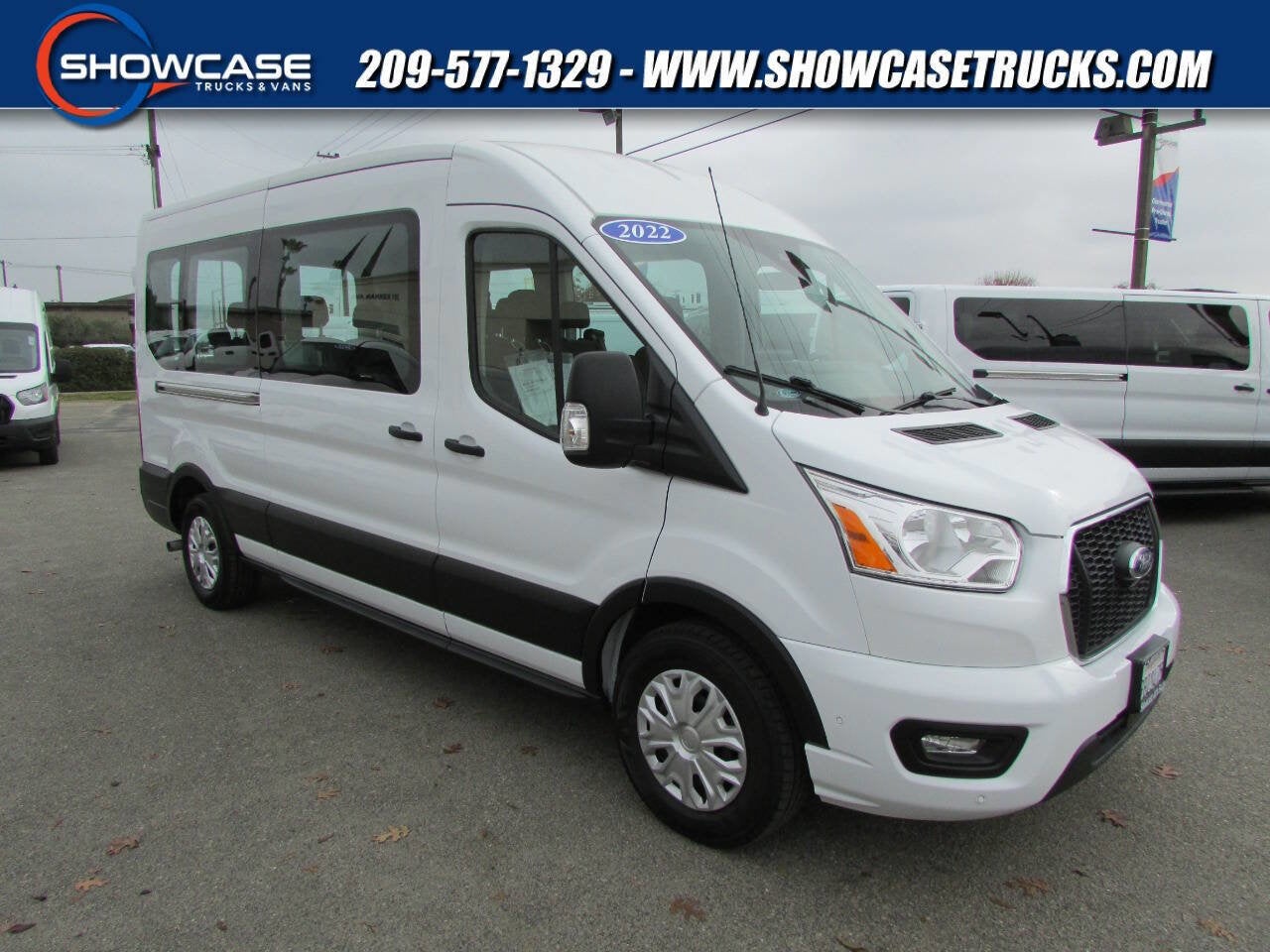 2022 Ford Transit Passenger Wagon 350 XLT 3dr LWB Medium Roof Passenger Van in Oxford White — front three-quarter view