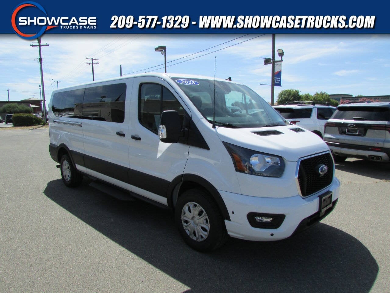 2025 Ford Transit Passenger Wagon 350 XLT 3dr LWB Low Roof Passenger Van in Oxford White — front three-quarter view