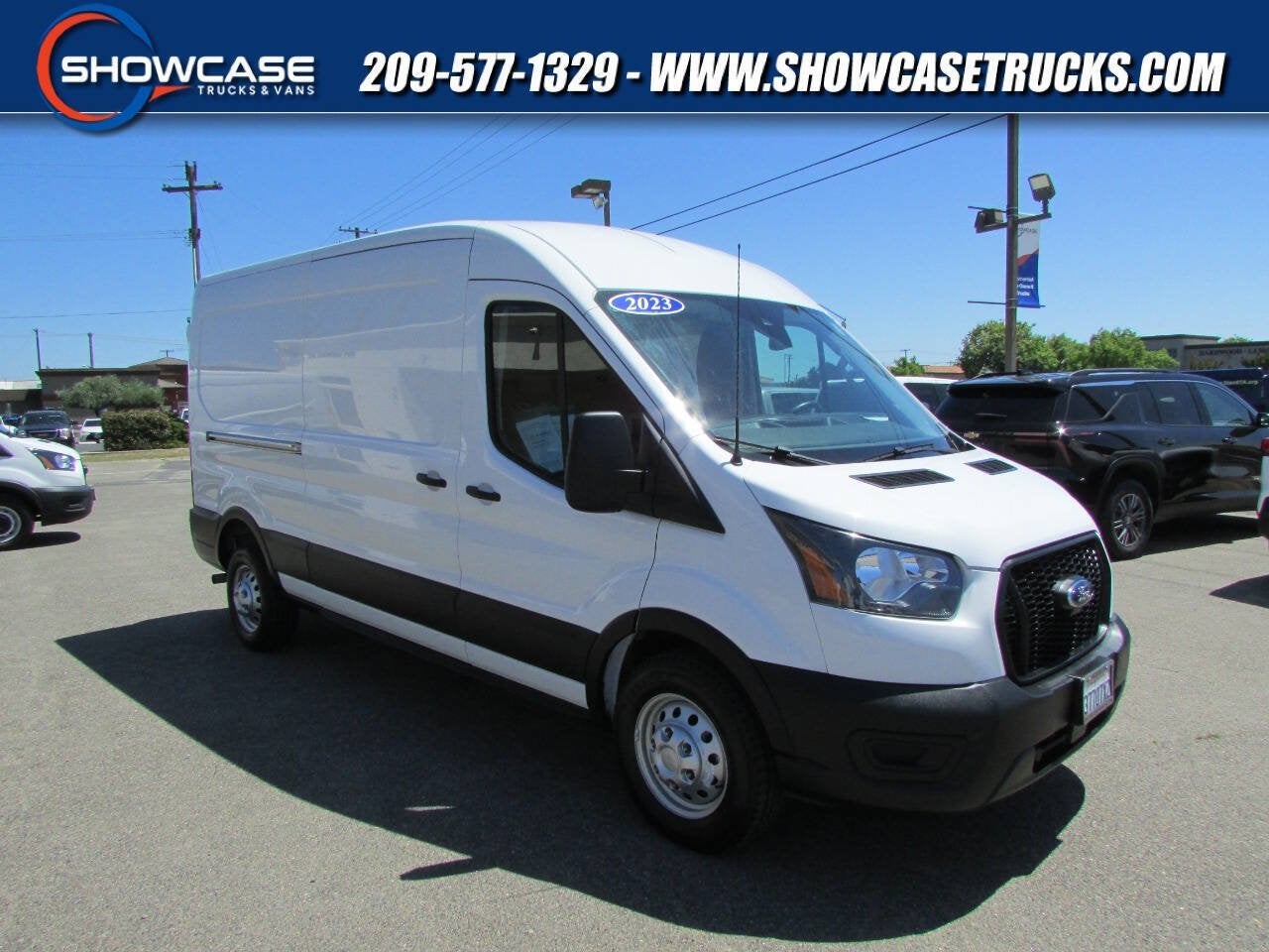 2023 Ford Transit Cargo Van 250 AWD 3dr LWB Medium Roof Cargo Van in Oxford White — front three-quarter view