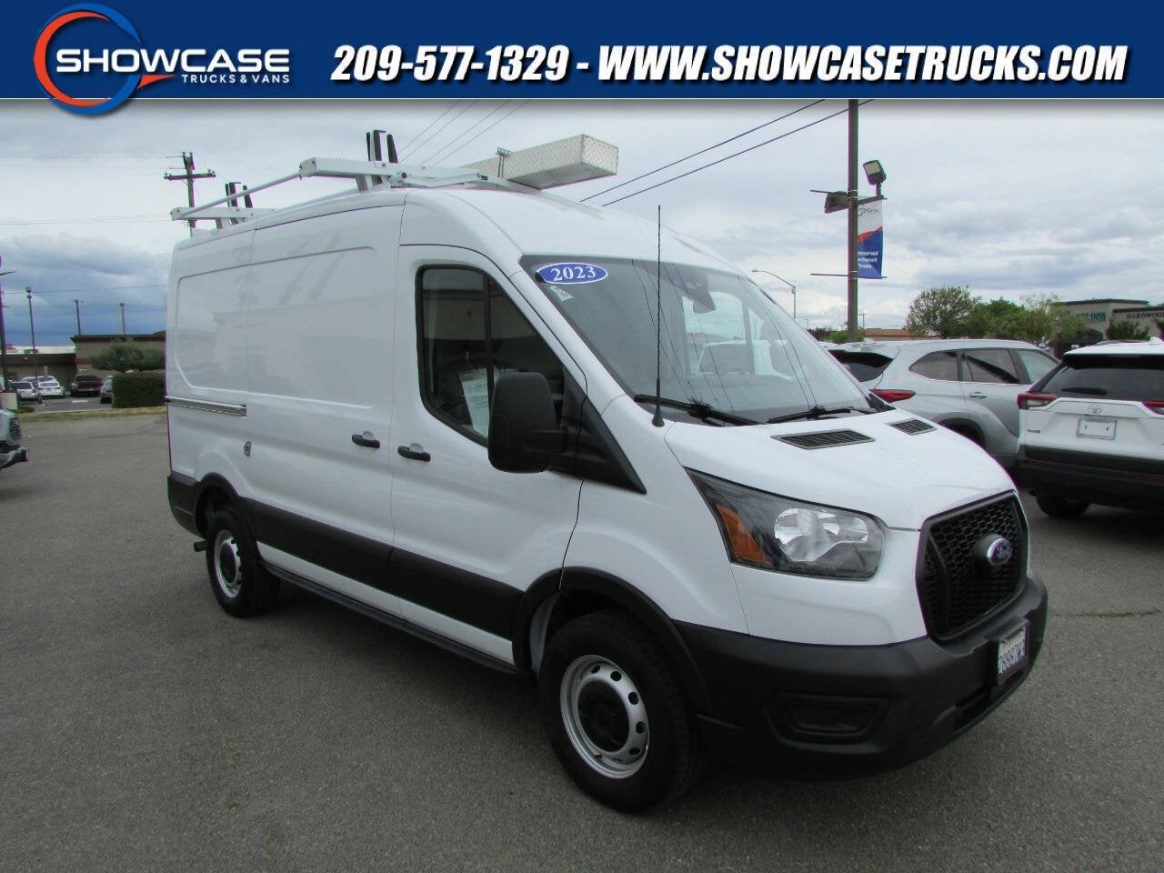 2023 Ford Transit Cargo Van 350 3dr SWB Medium Roof Cargo Van in Oxford White — front three-quarter view