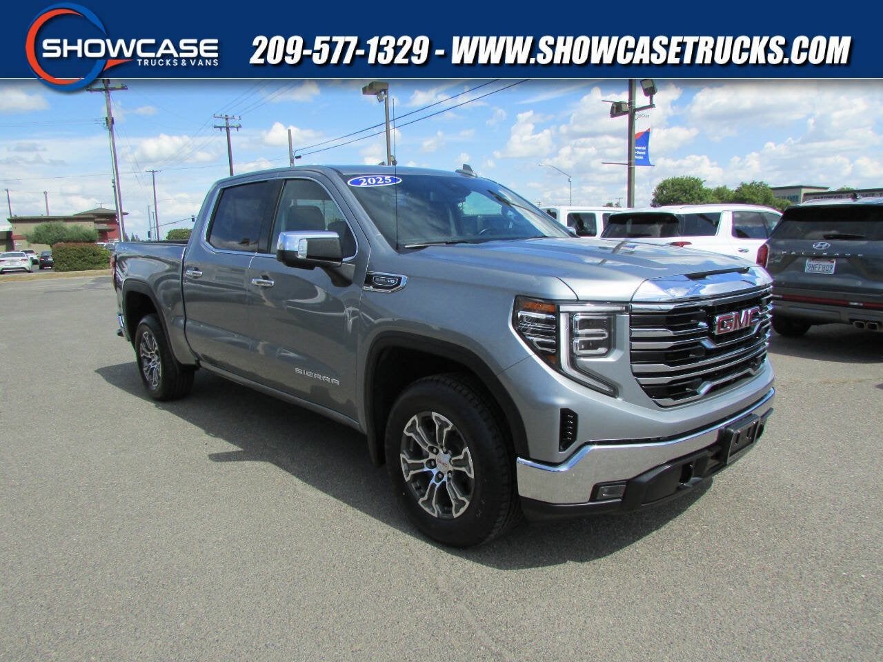 2025 GMC Sierra 1500 SLT in Sterling Metallic — front three-quarter view