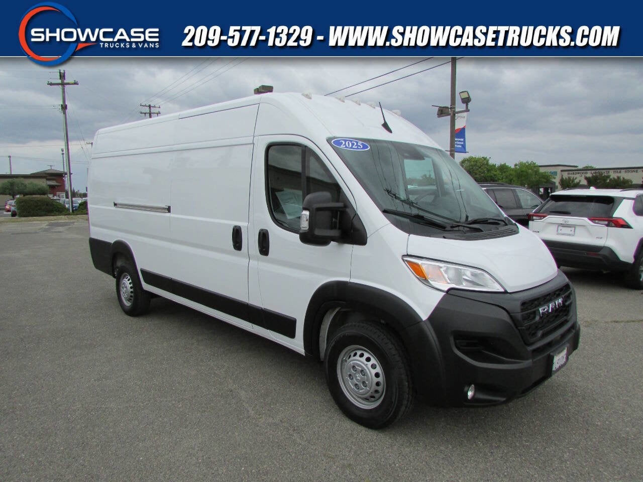 2025 RAM ProMaster Cargo Van Tradesman in Bright White Clearcoat — front three-quarter view