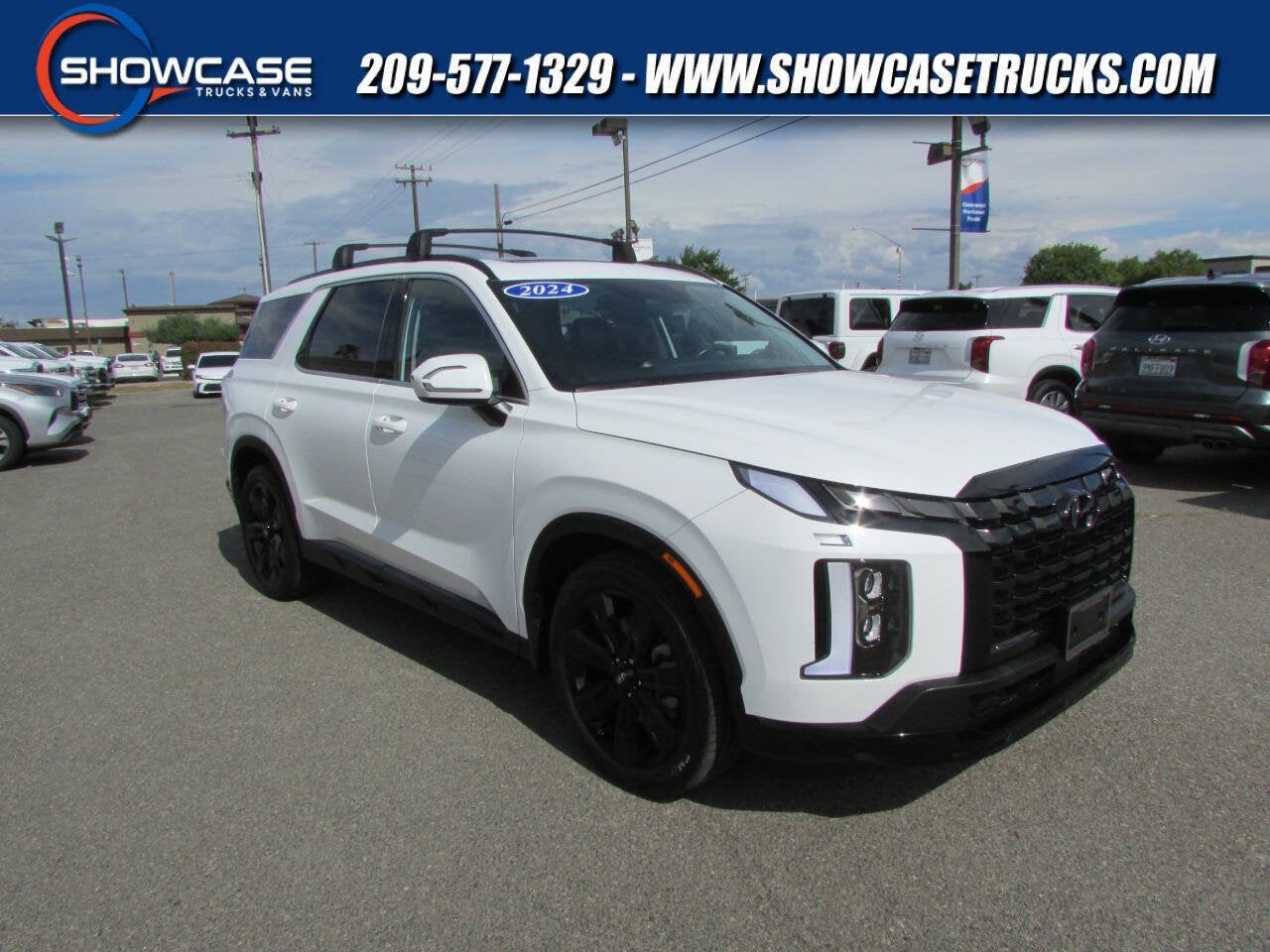 2024 Hyundai Palisade XRT in Hyper White — front three-quarter view